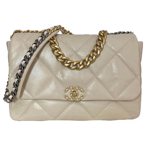 calza blu e chanel beige|Chanel beige handbags.